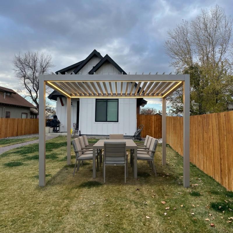 Wood pergola with lights on a home patio at dusk · reference photo